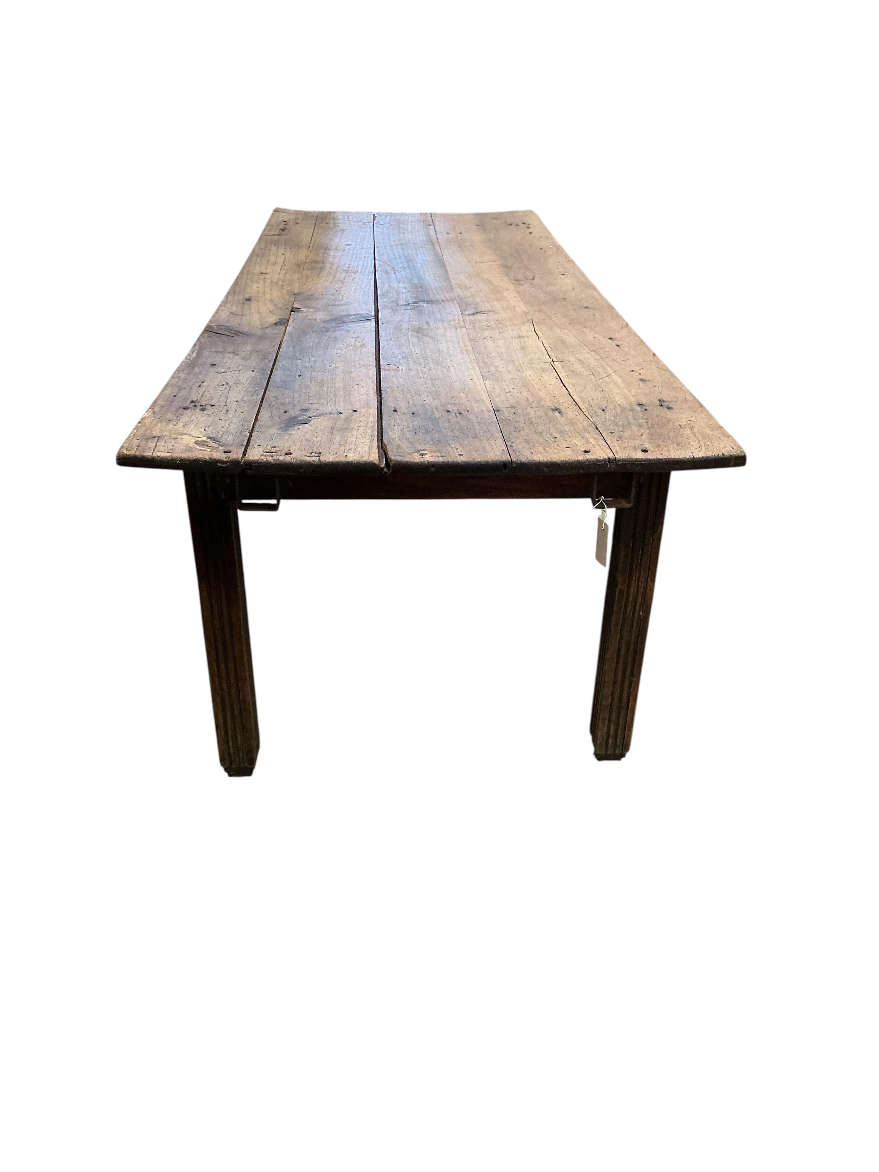 A 19th century French rectangular fruitwood kitchen table, width 224cm, depth 88cm, height 73cm